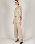 Full-length view of the taupe Birdie tank with taupe drawstring pants and black slide sandals