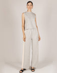 Full-length view of the heather gray Birdie tank with gray wide-leg pants with ivory side stripes
