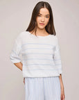 Gentle Fawn Kerrigan Sweater in white with sky blue stripes worn with striped shorts, front view