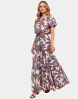 Azure Riviera palm blouse styled with matching tiered maxi skirt