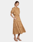 Side view of camel signature midi skirt