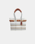 Convertible mini stripe handbag worn as shoulder bag and tote