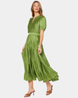 Current Air Arden Pleated Midi Dress in Olive showing the fluid tiered skirt