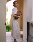 Model Holding Daniella Lehavi Vivian Maxi Convertible Clutch Tan