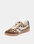 Three-quarter view of the Dolce Vita Merit Leopard Sneakers featuring a leopard calf hair upper, premium suede details, leather accents, and a comfortable rubber sole.