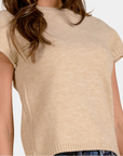 Detail of the Elan Sam Short Sleeve Sweater in Stone showing the lightweight knit and ribbed trim
