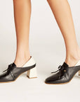 Back view of Stivali New York Focus loafers with off-white heels