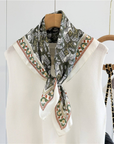 Greek Horse Mulberry Silk Scarf tied at the neck with olive and ivory print