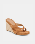 Helan espadrille wedge by Dolce Vita crafted in brown suede with a minimalist thong silhouette.