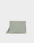 Montemare Blake’s Blue handbag front view with gold hardware, orange contrast stitching and tassel detail.