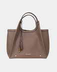 Front view of Montemare Sedona Work Tote in Cocoa Bean with braided handles, tassel and gold-tone details
