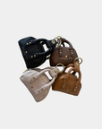 Oceans End mini handbag charm in multiple colors showing textured vegan leather detail