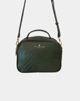 Oceans End Justine 2.0 crossbody bag in emerald featuring an embossed hibiscus design, top handle, adjustable crossbody strap, and gold-tone hardware.