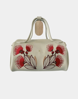 Oceans End Lehua convertible handbag in creme vegan leather with embroidered lehua flowers and top handles