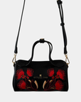 Oceans End Lehua convertible handbag in onyx with removable crossbody strap and lehua flower embroidery