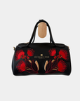 Oceans End Lehua convertible handbag in onyx vegan leather with embroidered lehua flowers and top handles