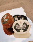 Oceans End Naupaka crossbody bag with embroidered floral design