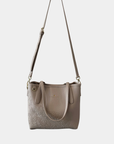 Oceans End Shawna convertible tote bag in bone worn as crossbody with adjustable strap
