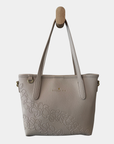Oceans End Shawna convertible tote bag in bone vegan leather front view with top handles