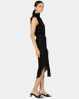 Side view of the P.CILL Diana Butter Modal Midi Skirt in Black showing the side slit and curved hem