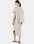 Back view of the P.CILL Diana Butter Modal Midi Skirt in Heather Grey showing the side slit