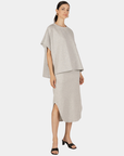 Front view of the P.CILL Diana Butter Modal Midi Skirt in Heather Grey styled with a coordinating top