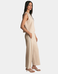 Side view of the P.CILL Lula Butter Modal Wide Leg Pants in Oatmeal with contrast side stripe