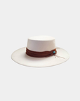 Front view of the Petra Savage Tasha Boater Crown Hat in beige with structured flat crown and wide brim.
