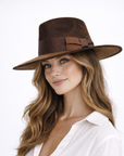 The Remi Rancher Crown Hat styled on a model for a modern, elevated look.