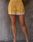 Resort embroidered shorts front view with lightweight fabric and detailed stitching