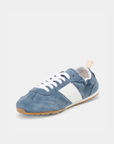 Blue suede sneaker from Dolce Vita Shyla offering a polished off-duty look.