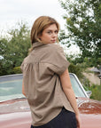 Back view of the Pin Stripe Button Down showing the pleated back yoke and relaxed fit
