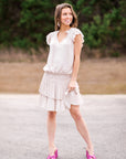 Flirty Pleated Mini - The Flaunt