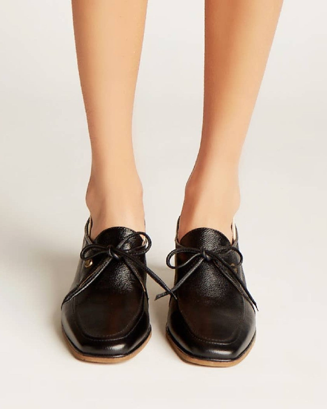 Front view of Stivali Focus black leather loafers with leather laces