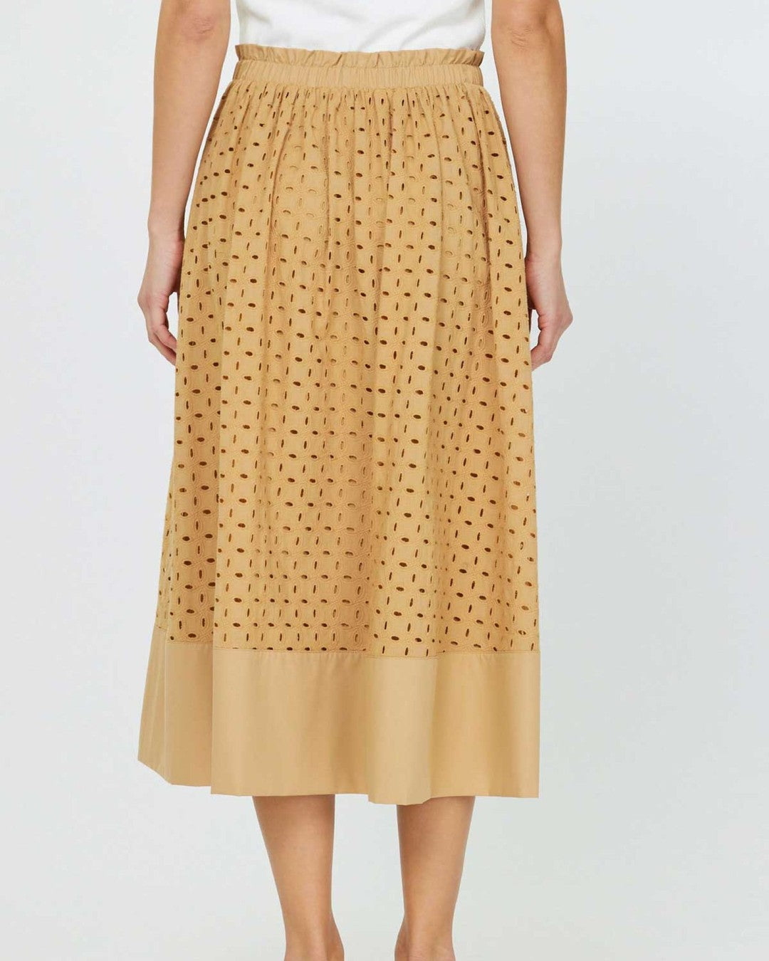 Back view of the butterscotch eyelet midi skirt with gathered elastic waist