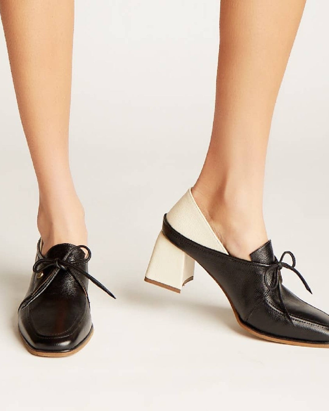 Stivali Focus black leather lace-up loafers on model, front angle