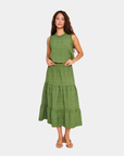 Model styled in D.RA Aviana top paired with D.RA Maya green tiered midi skirt for a chic matching set look.