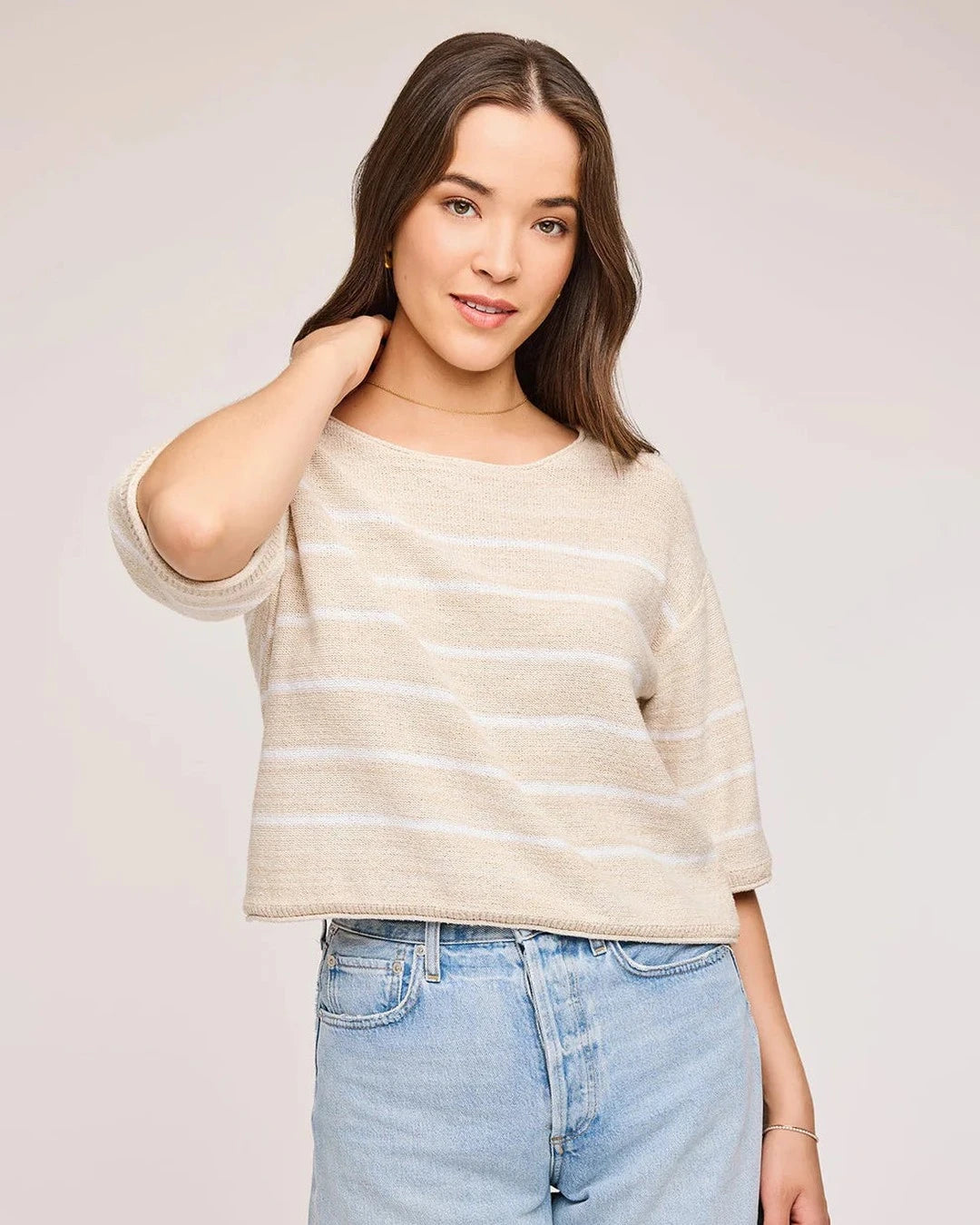 Gentle Fawn Kerrigan Sweater in oatmeal with white stripes worn with light denim shorts, front view