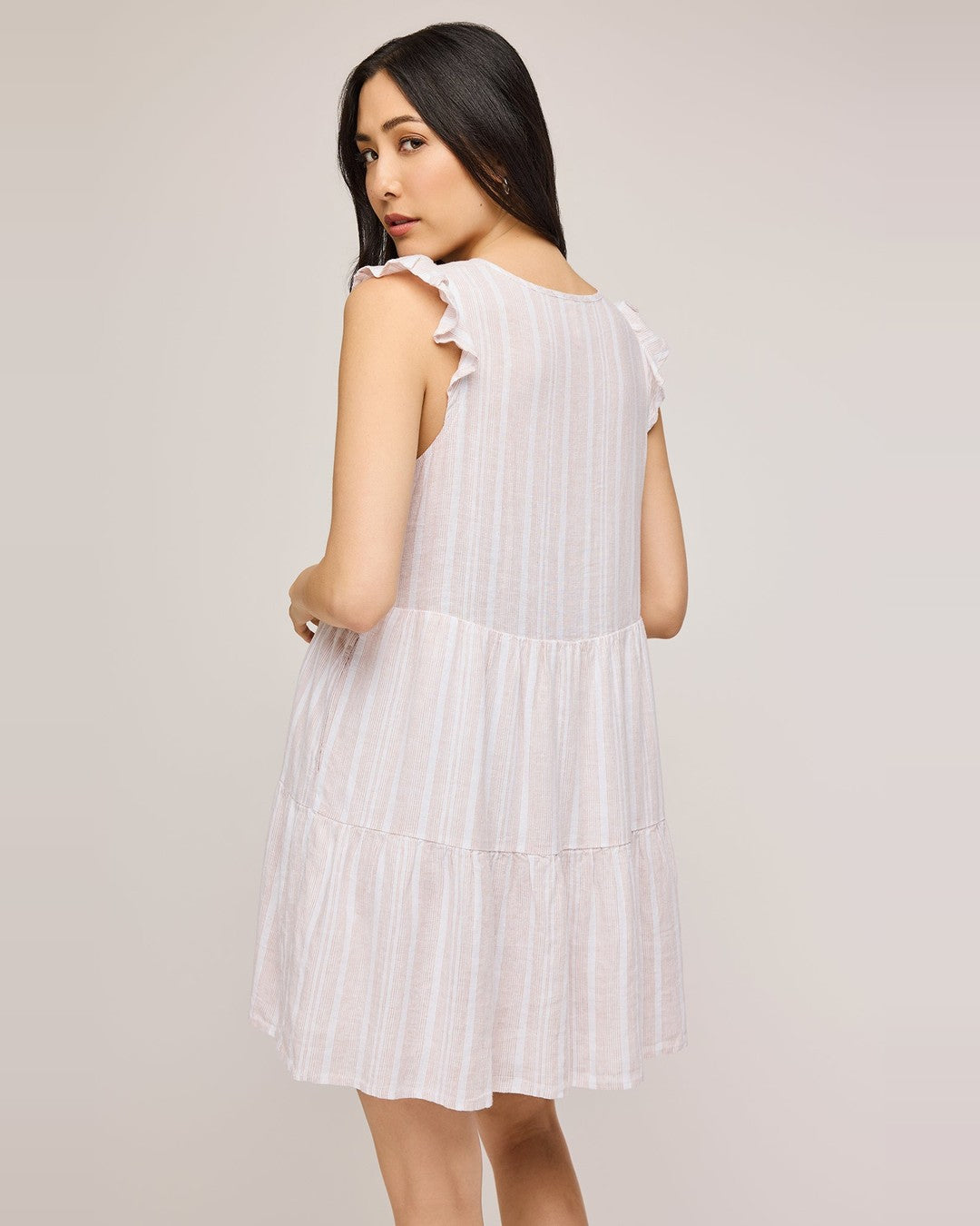 Back view of the Gentle Fawn Maggie Mini Dress showing the ruffle sleeves and tiered skirt