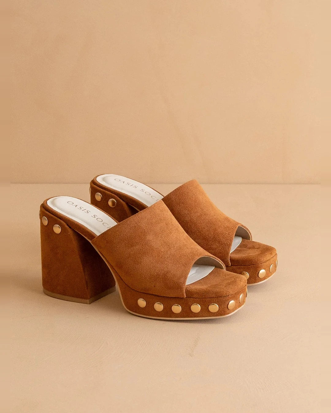 Pair of Oasis Society Leona caramel suede platforms with a block heel and gold-tone studs
