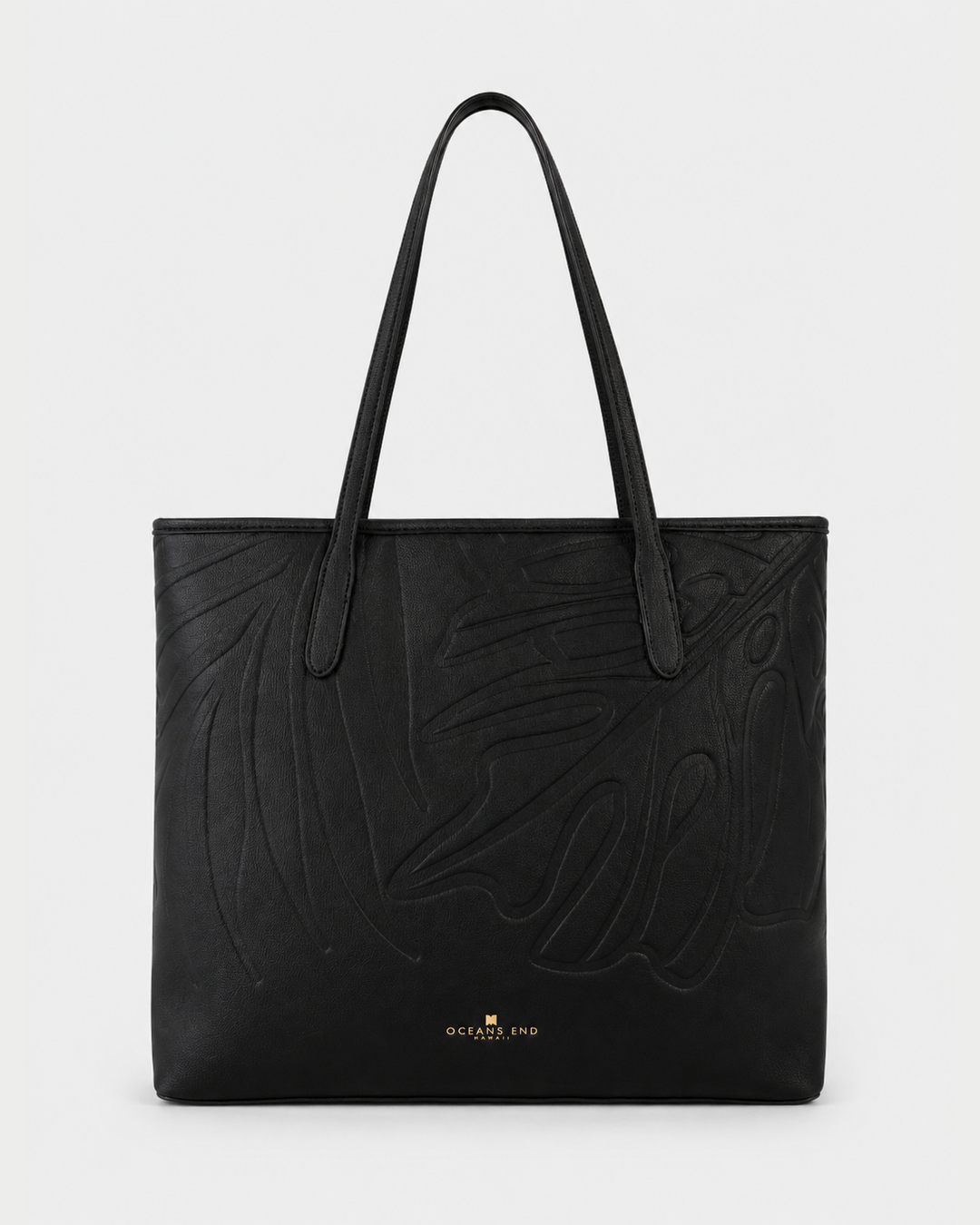 Oceans End Marnie Tote in Onyx with embossed tropical design and long shoulder straps