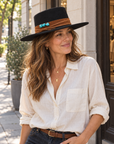 Model wearing the Petra Savage Tasha Boater Crown Hat in black with a casual Western outfit.