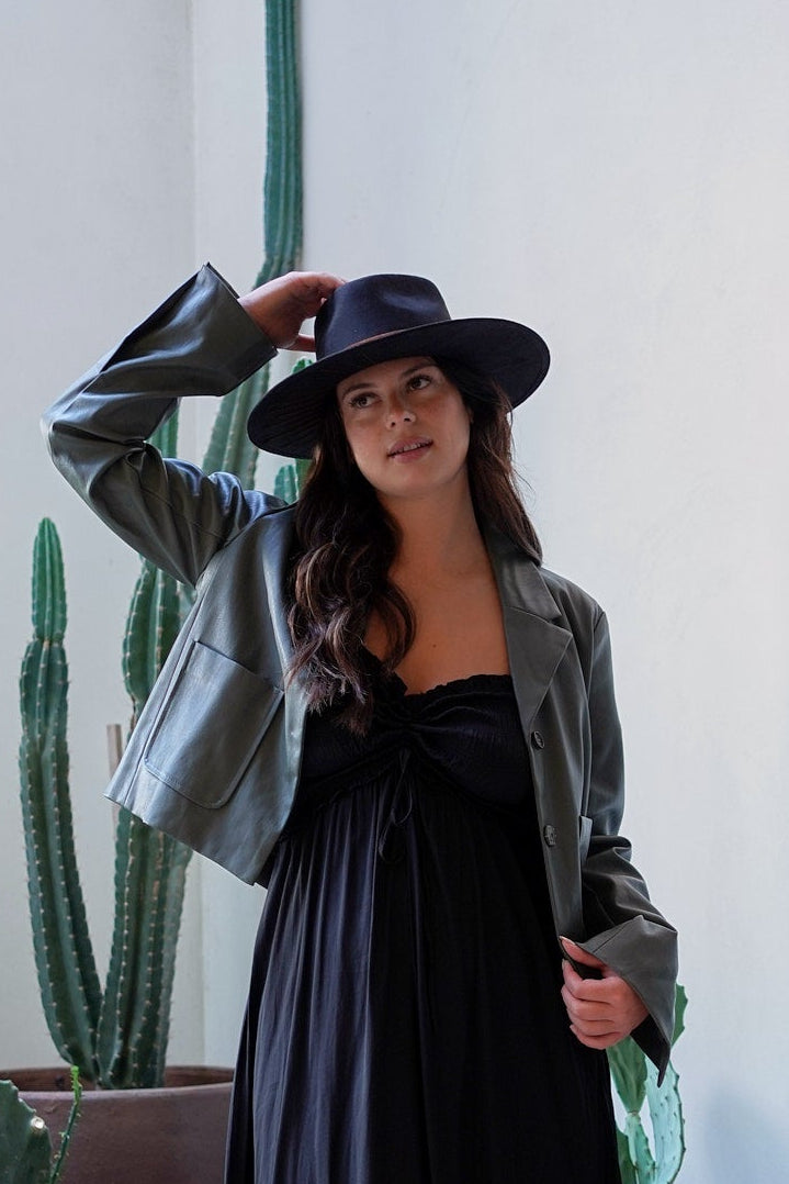 Styled Abasi Diamond Crown Hat worn with a chic outfit.