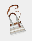 Convertible mini stripe handbag worn as shoulder bag and tote