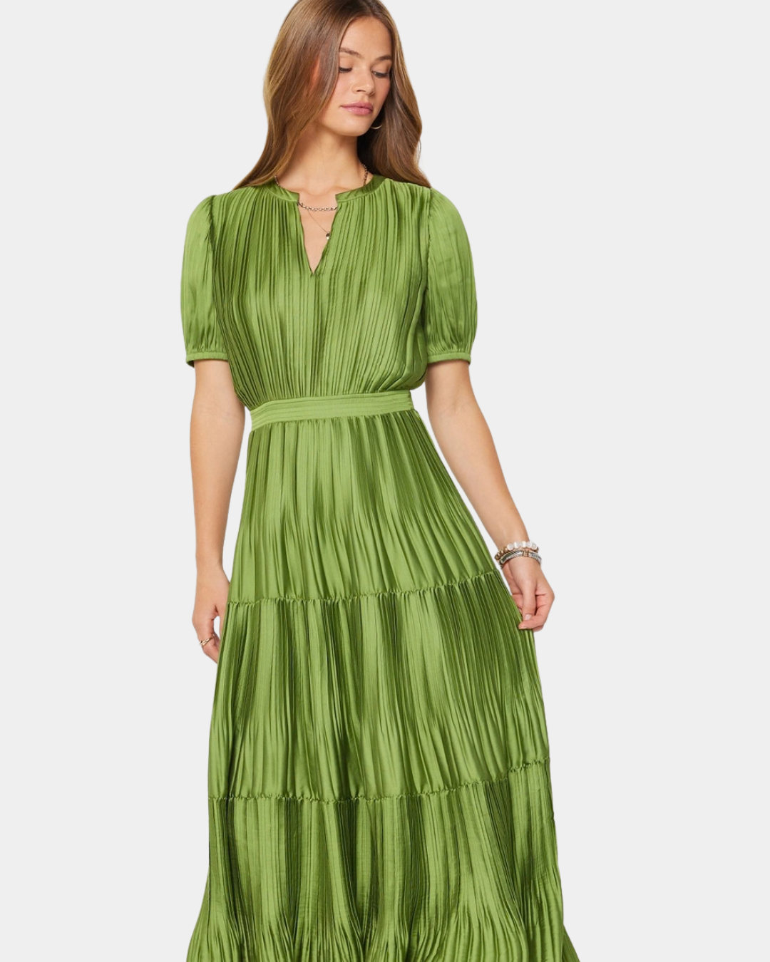 Detail of the Current Air Arden Pleated Midi Dress showing the fine pleating, split neckline and defined waist