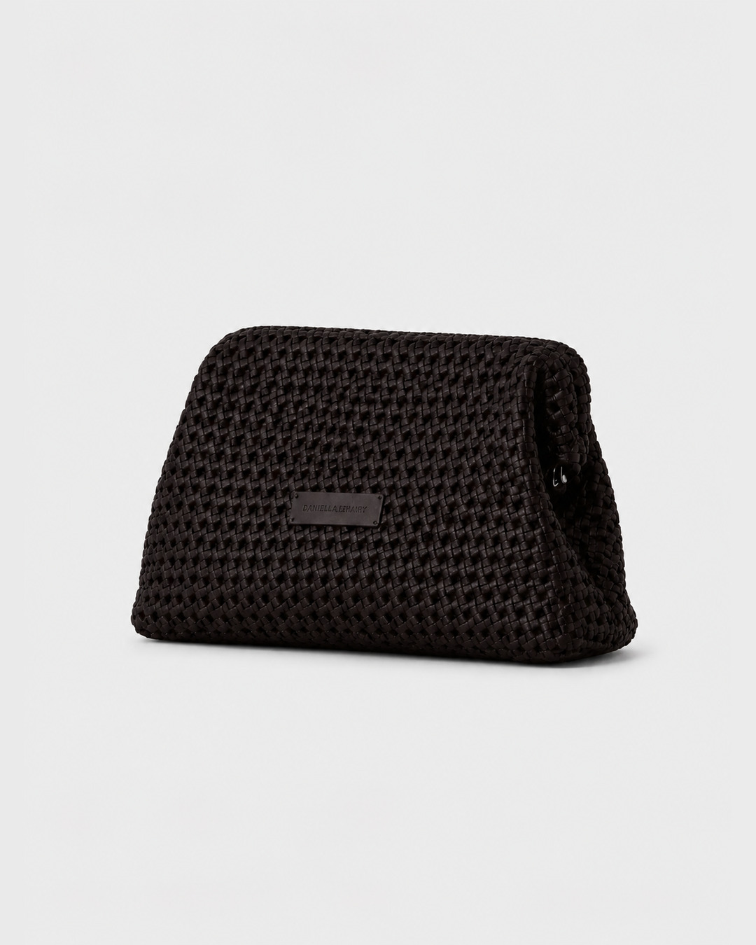 Daniella Lehavi Vivian Maxi Convertible Clutch in chocolate woven leather, angled view.