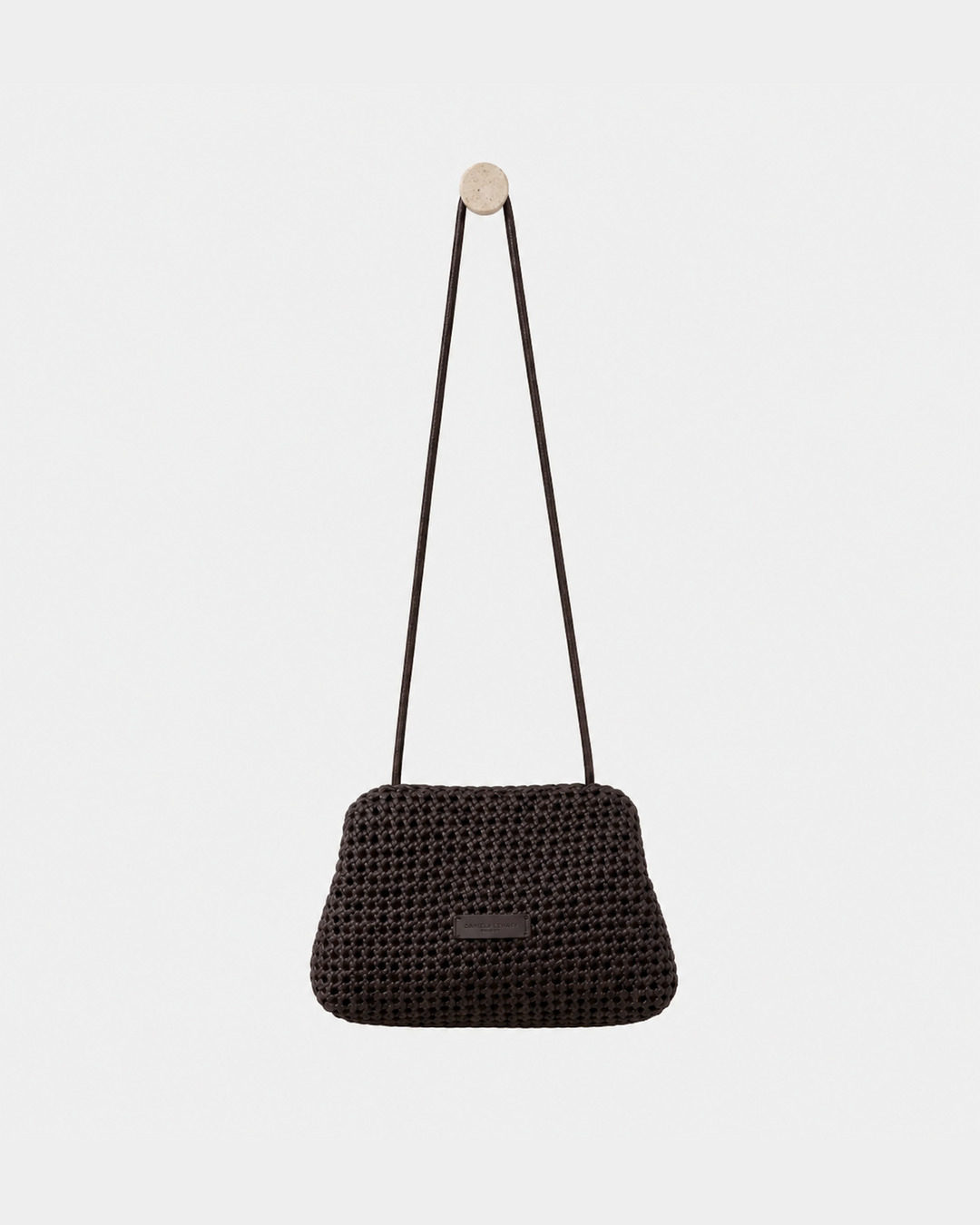 Daniella Lehavi Vivian Maxi Convertible Clutch in chocolate woven leather shown with the convertible shoulder strap.