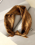Deco caramel mulberry silk scarf styled around the neck