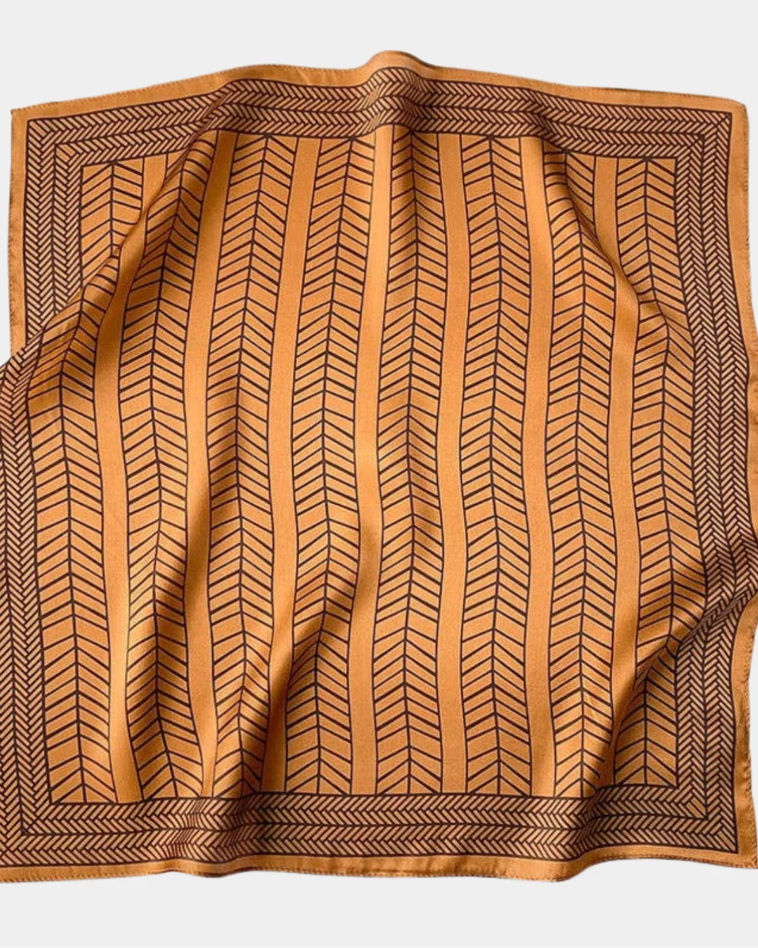 Deco caramel mulberry silk scarf flat lay showing vintage art deco pattern