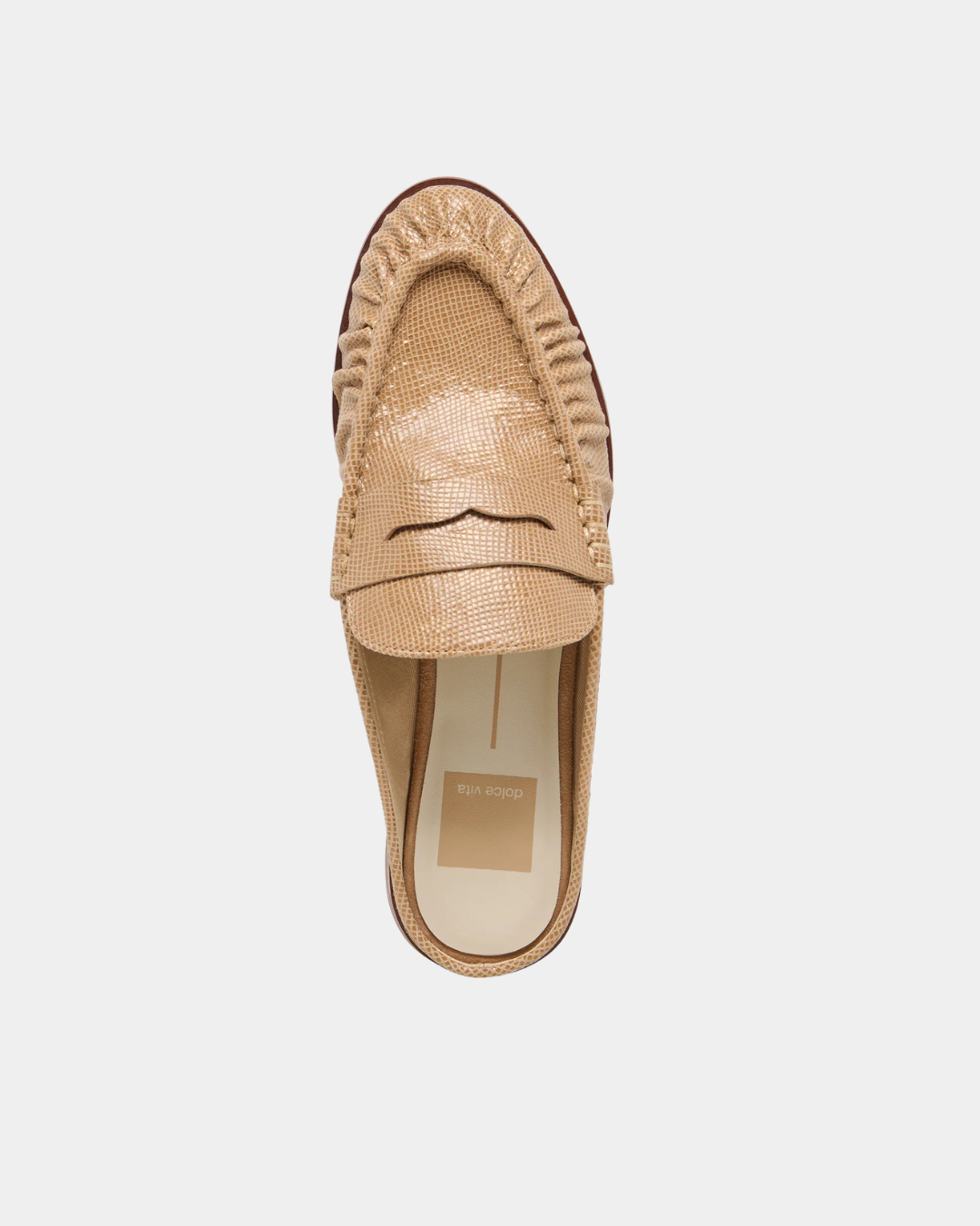 Top view of the Dolce Vita Betzy Loafers in crème embossed suede featuring the penny loafer strap, embossed suede upper, ruched moc toe, and slip-on mule silhouette.